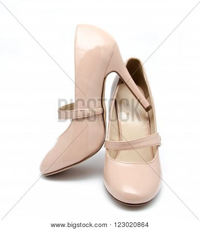 Biege high heel woman shoes isolated on a white
