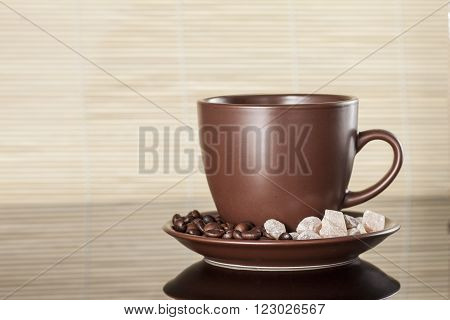 coffee cup with coffee and sugar on a light background