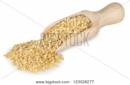 Bulgur or couscous in wooden scoop isolated on white background