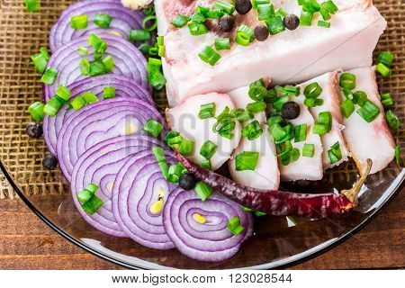 Fresh Pork Fat, With Red Hot Chili Peppers, Green And Purple Onions And  Peas Allspice Beautifully L