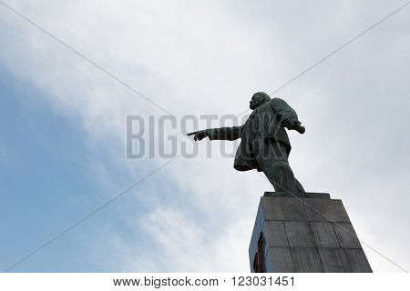 Monument to the leader of the proletariat Lenin against the sky