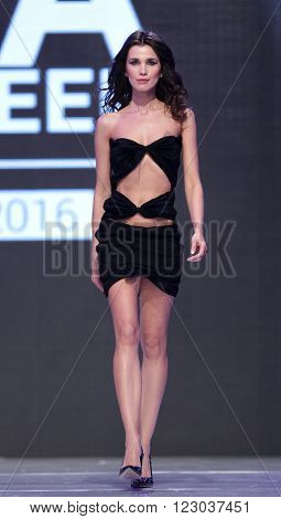 Sofia Bulgaria - March 23 2016: A model walks the runway at Sofia Fashion Week runway show. The fashion show is held for a second time in Bulgaria's capital.