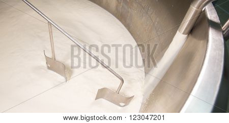 Cheesemaker -traditional Cheese Making At A Creamery,