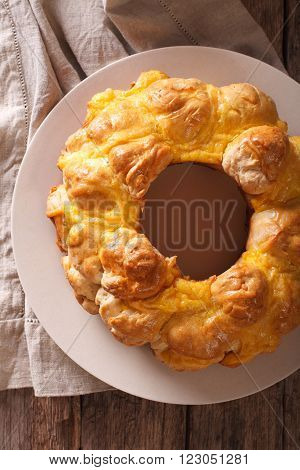 monkey bread with cheese close-up on the table. vertical top view