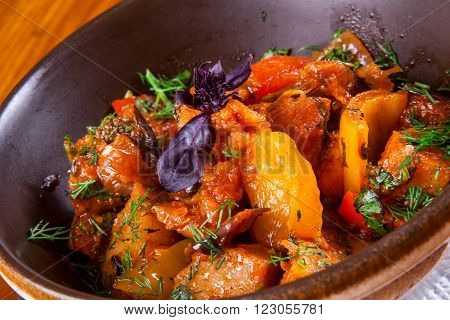 Caucasian cuisine. Ajapsandali with eggplant, pepper, tomato and herbs