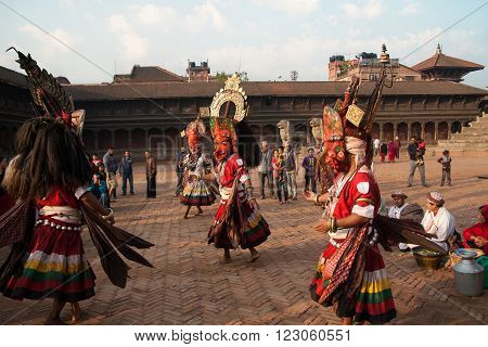 Bhaktapur, Nepal -  April 19 2013: Several Unknown Lamas Perform A Ritual Dance In Celebration Of Ne