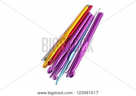 Multicolored crotchets of different size on white background