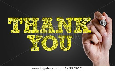 Hand writing the text: Thank You