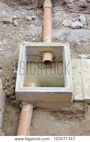 The construction of a new storm drain with two inlets being built