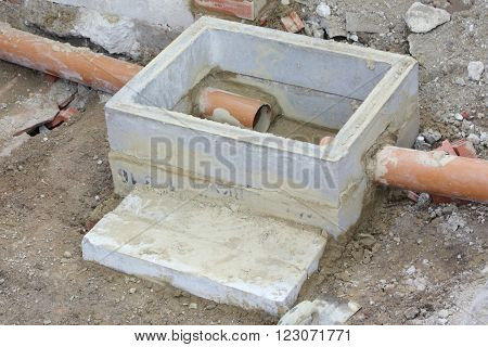 The construction of a new storm drain with two inlets being built