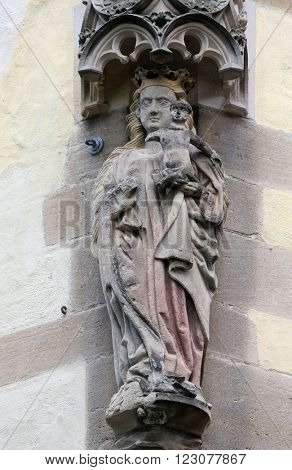 TUBINGEN, GERMANY - OCTOBER 21: Virgin Mary with baby Jesus, Collegiate Church of St. George in Tubingen, Germany on October 21, 2014.