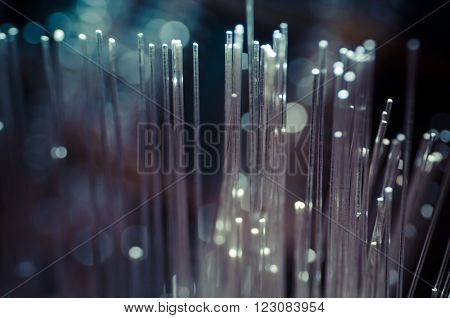 Fiber optic cables, fibre connection, telecomunications concept.