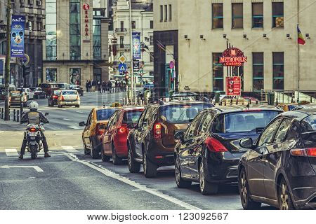 Bucharest, Romania - March 16, 2014: Rush hour, traffic jam on Victory Avenue (Calea Victoriei), a major avenue in central Bucharest city.