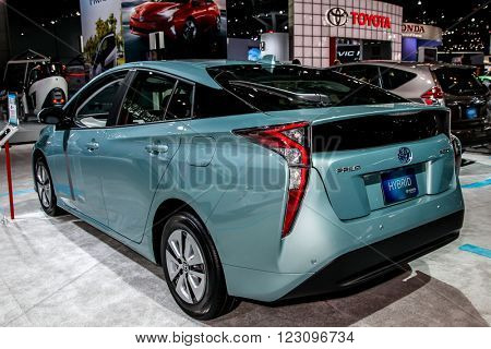 NEW YORK - March 23: A Toyota Prius exhibit at the 2016 New York International Auto Show during Press day,  public show is running from March 25th through April 3, 2016 in New York, NY.