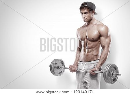 Muscular Bodybuilder Guy Doing Exercises With Big Dumbbell