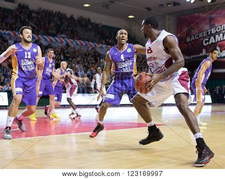 SAMARA RUSSIA - NOVEMBER 06, 2013: BC Krasnye Krylia forward Demetris Nichols (8) with ball goes against a BC Royal Hali Gaziantep player on November 06 2013 in Samara Russia.