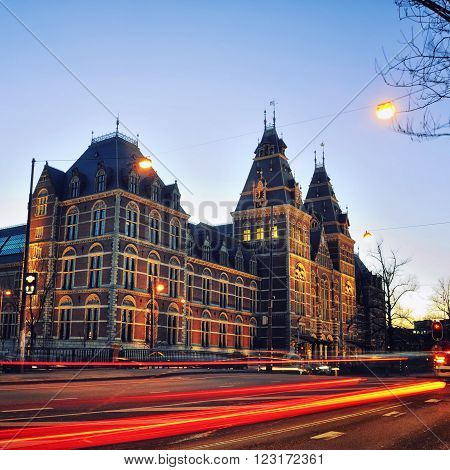 Rijksmuseum in Amsterdam Netherlands. Night view of Dutch national museum which has on display thousands objects of art and history and very popular among tourists