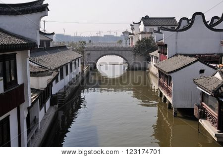 The water canals and buildings of Zhaojialou town in shanghai china.