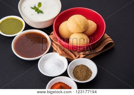 dahi vada or dahi vade also known as Curd Vadai in South India, a popular snack famous all over India prepared by soaking lentil vadas in thick dahi or yogurt, topped with spicy & sweet chutney etc