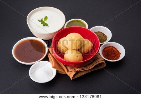 dahi vada or dahi vade also known as Curd Vadai in South India, a popular snack famous all over India prepared by soaking lentil vadas in thick dahi or yogurt, topped with spicy & sweet chutney etc