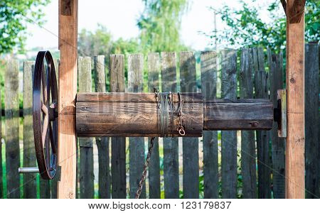 Wooden Well crank with the hawser rope.