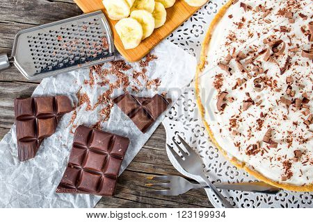 banoffee with banana decorated by chocolate authentic english dessert , top view
