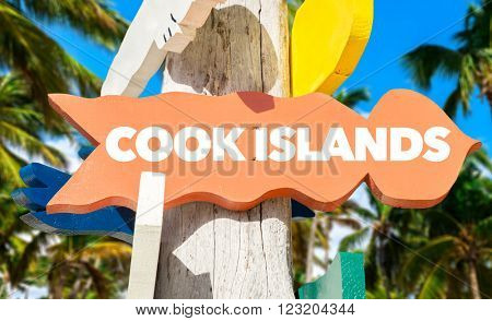 Cook Islands signpost with palm trees