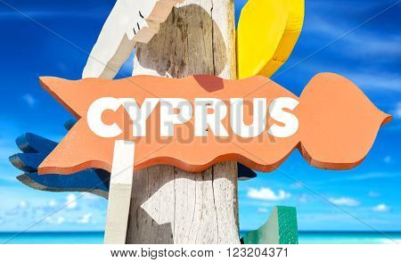 Cyprus signpost with beach background