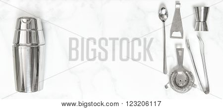 Shaker jigger strainer tongs spoon. Bar accessories for cocktail making. Food and drink
