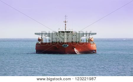 Busan South Korea - March 9th 2016: Busan road of the port of Busan anchorage of sea vessels the specialist vessel MEGA TRUST weighs anchor.