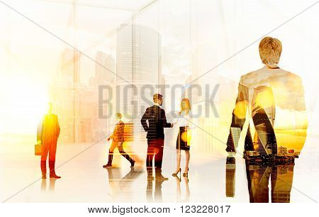 Businesspeople in office office and city view. Double exposure. Toned filter. Concept of communication