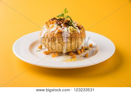 Rajasthani Shahi Raj Kachori, stuffed katchori with potato and sprout filling and served with curd, chutney and sev