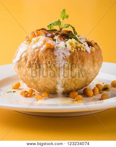 Rajasthani Shahi Raj Kachori, stuffed katchori with potato and sprout filling and served with curd, chutney and sev