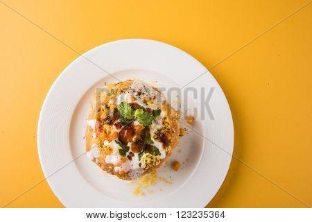 Rajasthani Shahi Raj Kachori, stuffed katchori with potato and sprout filling and served with curd, chutney and sev