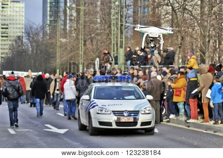 BRUSSELS BELGIUM - JANUARY 11 2015: A drone flying over the Brussels event against terrorism and support for freedom of expression after the attacks against the magazine Charlie hebdo