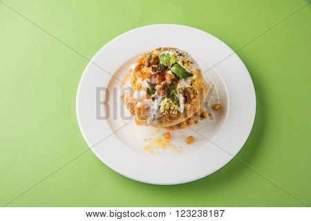 Rajasthani Shahi Raj Kachori, stuffed katchori with potato and sprout filling and served with curd, chutney and sev