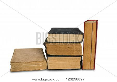 A stack of old books on a white background