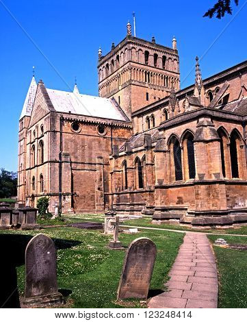SOUTHWELL, UNITED KINGDOM - MAY 16, 1992 - View of Southwell Minster with gravestones in the foreground Southwell Nottinghamshire England UK Western Europe, May 16, 1992.