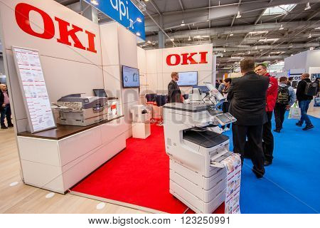 HANNOVER GERMANY - MARCH 15 2016: Booth of OKI company at CeBIT information technology trade show in Hannover Germany on March 15 2016.