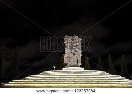 BAKU, AZERBAIJAN - JANUARY 28 2014 
Sculpture at night in Dede Gorgud Park, Baku, capital of Azerbaijan. A modern piece of art installed in a new park in the centre of Baku.