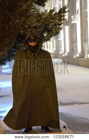BAKU, AZERBAIJAN - JANUARY 31 2014 
Azerbaijani soldier on guard in snow in Baku, in the capital of Azerbaijan. A military guard outside a government building is dressed up against an unusual snowfall in the centre of Azerbaijan's capital city