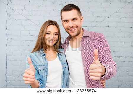 Smiling Couple In Love Embracing And Gesturing 