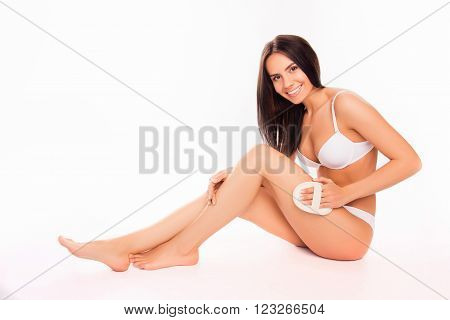 Beautiful Smiling Young Woman Making A Scrub Massage