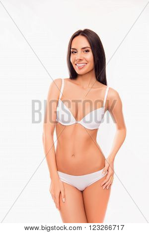 Cheerful Healthy Slim Brunette Posing In White Lingerie