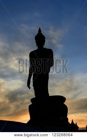 Silhouette of standing big Buddha statue during twilight time