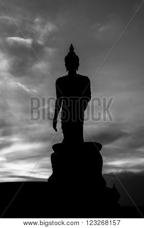 Silhouette of standing big Buddha statue during twilight time