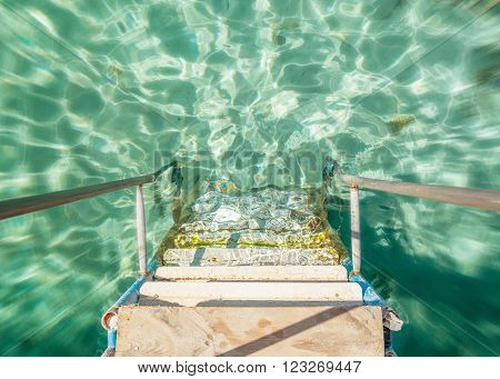 The steps leading to the water at sunset