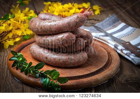Homemade white sausage out pigs meat. Selective focus.
