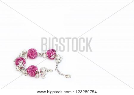 Pink beaded bracelet in the left corner
** Note: Shallow depth of field