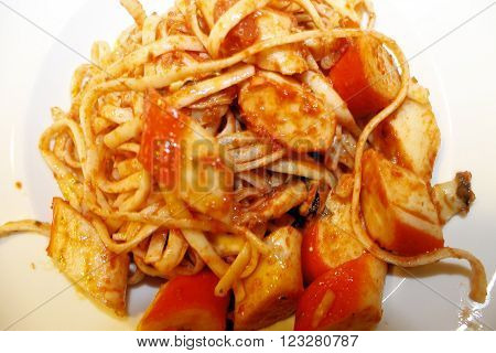 pasta with tomado sauce, seafood and crab meat